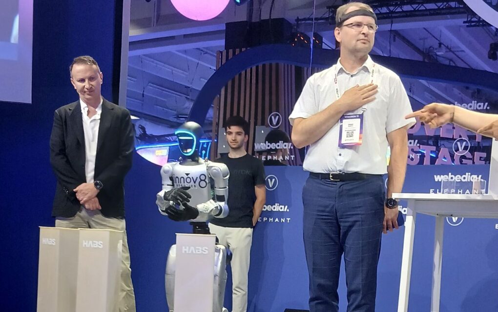 Image At VivaTech, a Human Communicated with a Humanoid Robot Through Thought